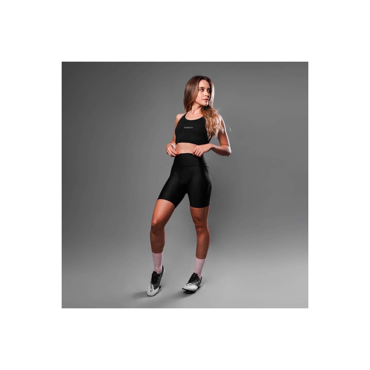 BERMUDA CICLISMO WOOM SUPREME FEMININA 2024