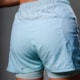 SHORTS RUNNING WOOM 2 EM 1 MARATHON FEMININO VERDE